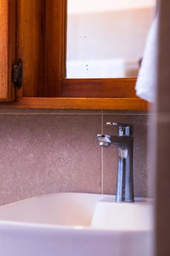 Un baño de Ola Bonita BeachFront Apart Hotel