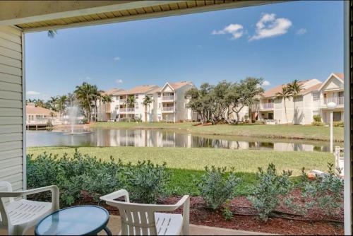 a view of a lake from the patio of a house at Serene Pondside Getaway - BC10 in Melbourne