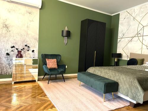 Ένα ή περισσότερα κρεβάτια σε δωμάτιο στο Glam Apartman Miskolc