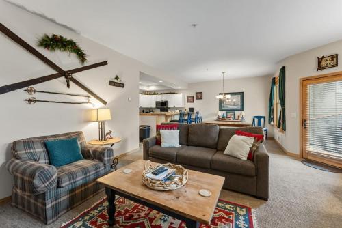 a living room with two couches and a table at Cozy Breck Condo - Walk to Main St & Lifts - Hot Tub in Breckenridge
