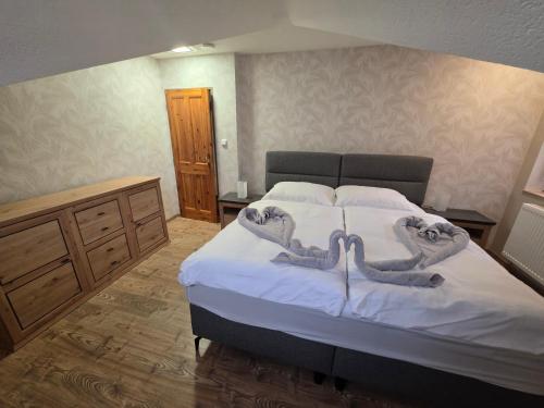 Postel nebo postele na pokoji v ubytování Penzion Bedřiška