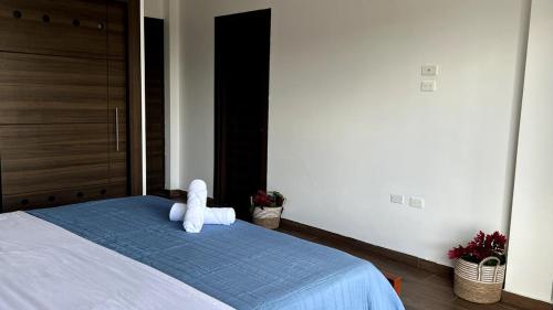 Postel nebo postele na pokoji v ubytování Casa Familiar Moderna