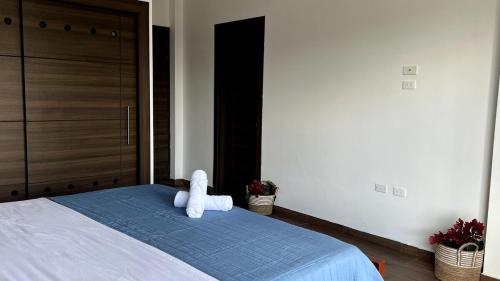 Postel nebo postele na pokoji v ubytování Casa Familiar Moderna