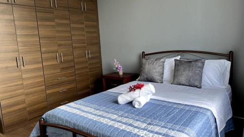 Postel nebo postele na pokoji v ubytování Casa Familiar Moderna