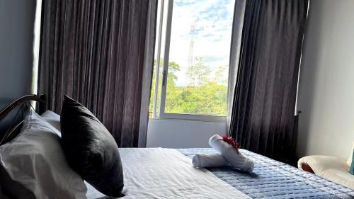 Postel nebo postele na pokoji v ubytování Casa Familiar Moderna