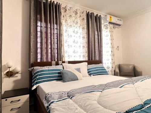 Postel nebo postele na pokoji v ubytování Cozy Lovely 1-bedroom apartment