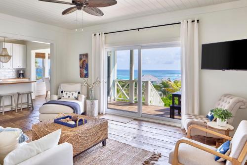 a living room with a view of the ocean at Bohemia Two Bedroom home in James Cistern
