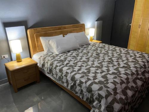 Postel nebo postele na pokoji v ubytování Abode of Peace Aruba