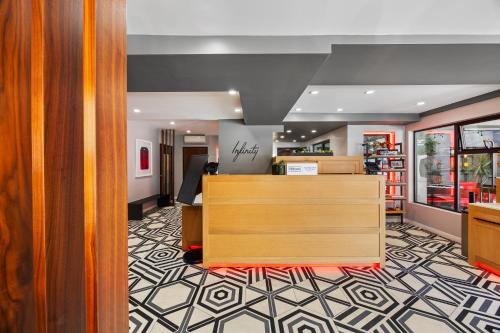 a lobby of a store with a reception desk at Infinity Hotel San Francisco, Tapestry Collection by Hilton in San Francisco