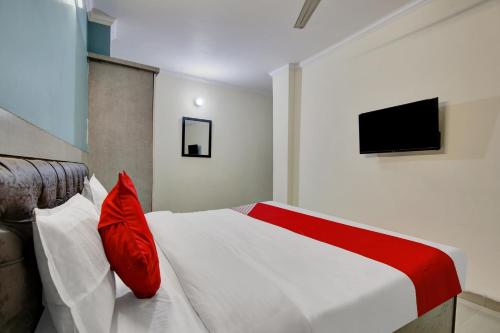 Телевизор и/или развлекательный центр в Hotel O Prime Stay