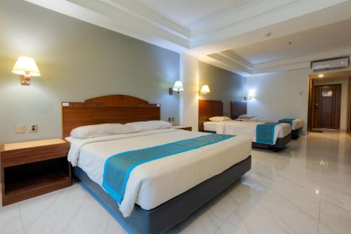 Cama o camas de una habitación en Hotel Sahid Bandar Lampung
