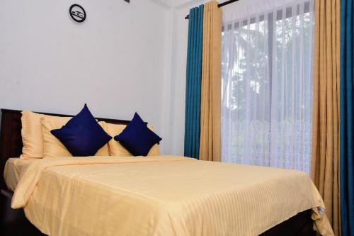 Ένα ή περισσότερα κρεβάτια σε δωμάτιο στο Urban Nest Apartment