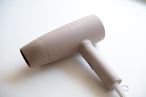 a white wii remote on a white background at Happiness Ohama一軒家東名静岡インター五分 in Shizuoka