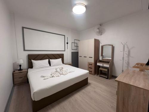 Ένα ή περισσότερα κρεβάτια σε δωμάτιο στο Chanthonghomestay