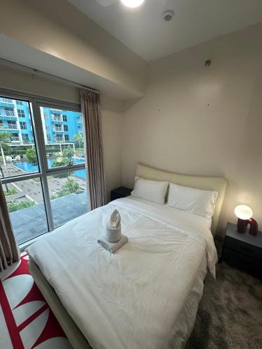 Letto o letti in una camera di Luxury Penthouse & High-Floor Hotel near City of Dreams, Airport, Okada, and Solaire Casino