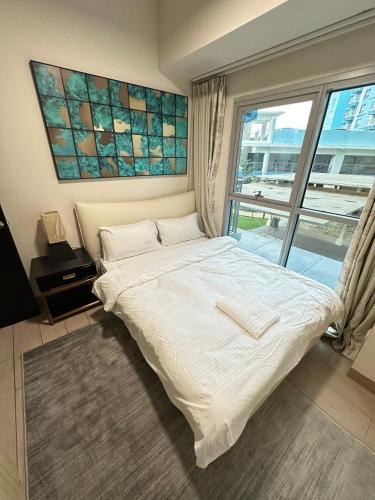 Letto o letti in una camera di Luxury Penthouse & High-Floor Hotel near City of Dreams, Airport, Okada, and Solaire Casino