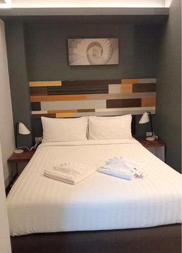 Ein Bett oder Betten in einem Zimmer der Unterkunft Campagne Hotel and Residence - SHA Plus