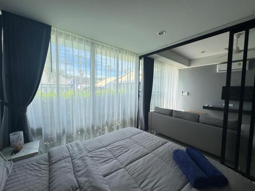 Postel nebo postele na pokoji v ubytování Larnthong Villa Fisherman Bophut Kohsamui