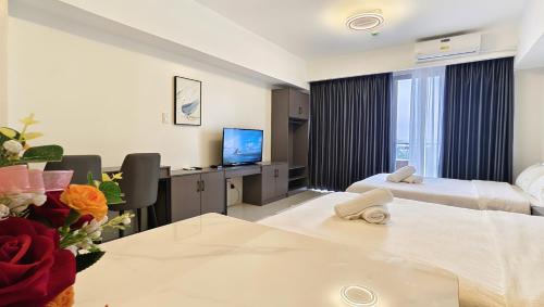 Letto o letti in una camera di Luxury Penthouse & High-Floor Hotel near City of Dreams, Airport, Okada, and Solaire Casino