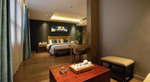 Letto o letti in una camera di Southeast Peninsula Hotel Quanzhou