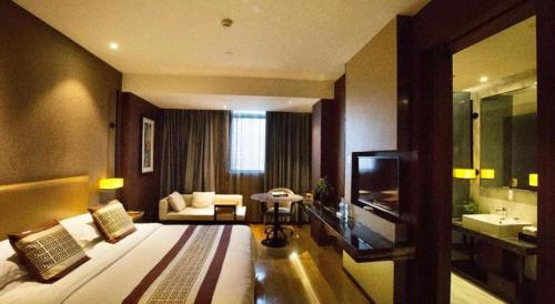 Letto o letti in una camera di Southeast Peninsula Hotel Quanzhou