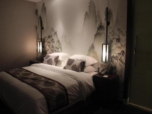 Letto o letti in una camera di Southeast Peninsula Hotel Quanzhou