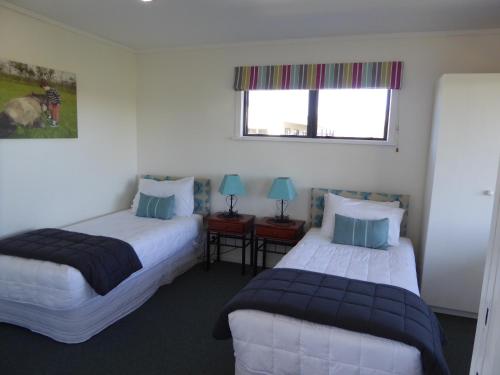 Postel nebo postele na pokoji v ubytování Cottages On St Andrews