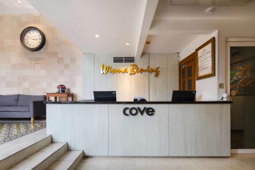Ο χώρος του λόμπι ή της ρεσεψιόν στο Cove Bening Boutique