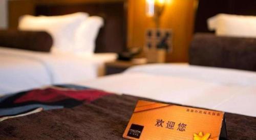 James Joyce Coffetel· Wuhan Wangjiawan Taojialing Metro Stationにあるベッド
