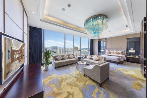 Ένα ή περισσότερα κρεβάτια σε δωμάτιο στο Xincheng hotel
