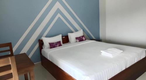 Letto o letti in una camera di Iyara Residence