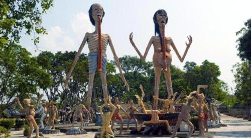 a group of statues of men standing in a park at Bangsaen Villa Hotel in Si Racha