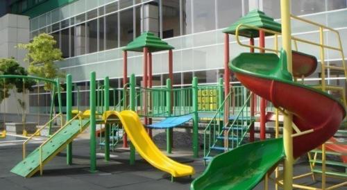 a playground with a slide and a slide at CK Tanjungpinang Hotel and Convention Centre in Tanjung Pinang 