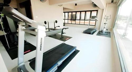 an overhead view of a gym with a treadmill at Wsotel Hotel in Songkhla