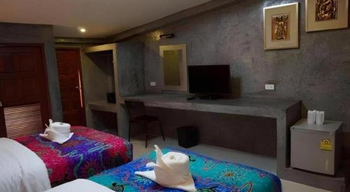 Letto o letti in una camera di Saikaew Boutique Hotel