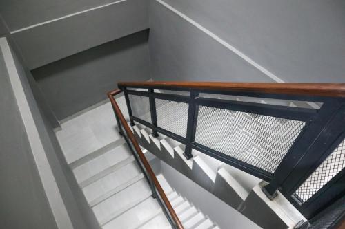 Commodious Hotel Kupangにあるベッド