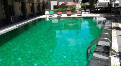 Πισίνα στο ή κοντά στο Honey Lodge