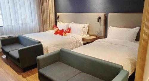 Letto o letti in una camera di Holiday Inn Express Jingdezhen Ancient Town By IHG