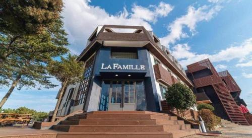 a building with the name la famille on it at La Famille in Yangyang
