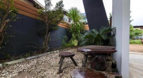 Jardín al aire libre en Maximize Brand New Hostel Udonthani