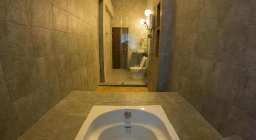 Un baño de Maximize Brand New Hostel Udonthani