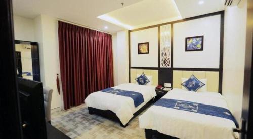 Katil atau katil-katil dalam bilik di Tuong Minh Hotel