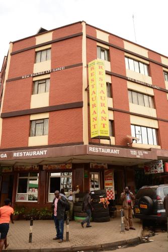 a building with people walking in front of it at New Swanga in Nairobi