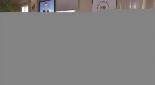 a white counter top in a room with a tv at Shell Baoding Dongfeng Middle Road Kailian Hotel in Baoding