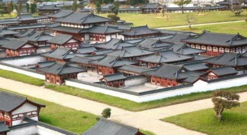 a large group of buildings with black roofs at Xi'an Huiya Tianmu Hotel in Xi'an