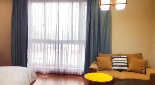 Posezení v ubytování GreenTree Inn Jiaxing Tongxiang Tudian Express Hotel