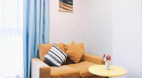 Posezení v ubytování GreenTree Inn Jiaxing Tongxiang Tudian Express Hotel
