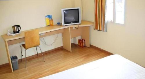 Μια τηλεόραση ή/και κέντρο ψυχαγωγίας στο 7 Days Inn Changsha Xingsha Zhongmaocheng Windows of the World