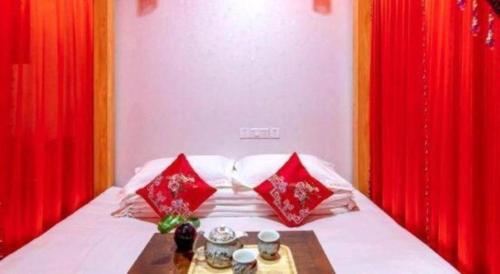 Cama o camas de una habitación en Pingyao Yufengheng Hotel
