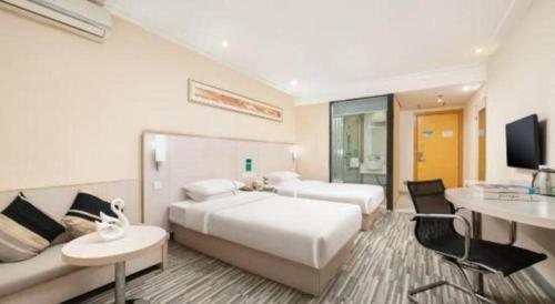 Cama o camas de una habitación en City Comfort Inn Nanning Guangxi University Xiuling Road Metro Station